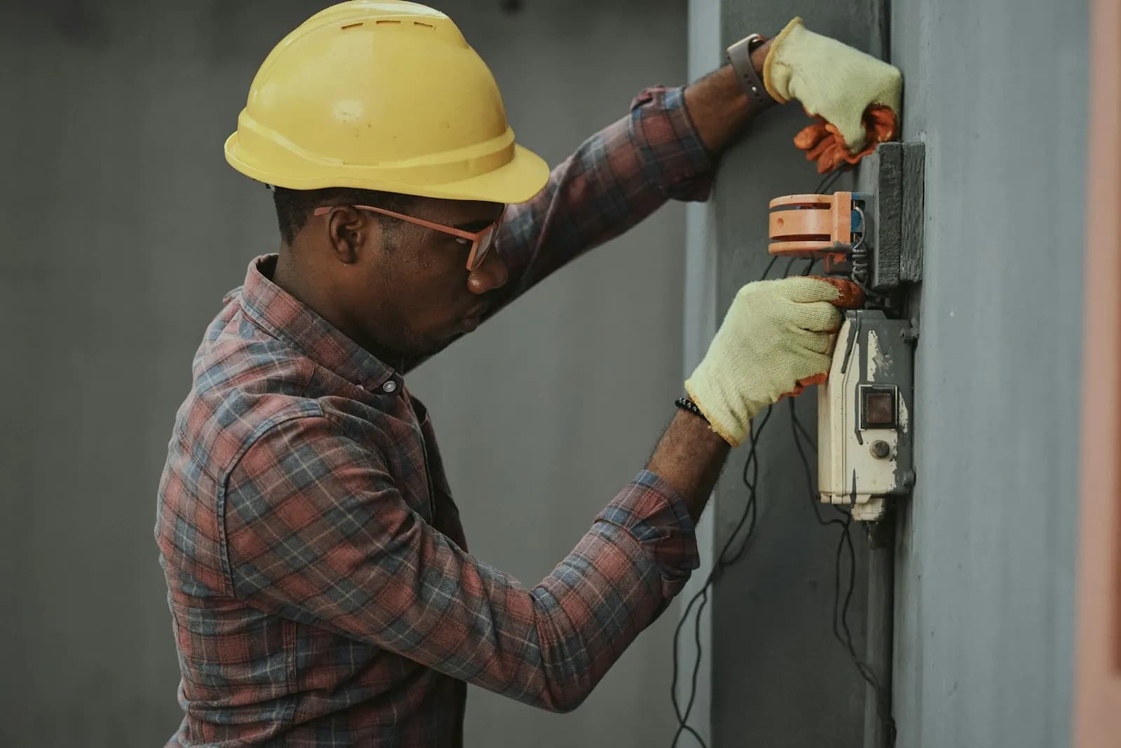 Electrician testing a consumer unit