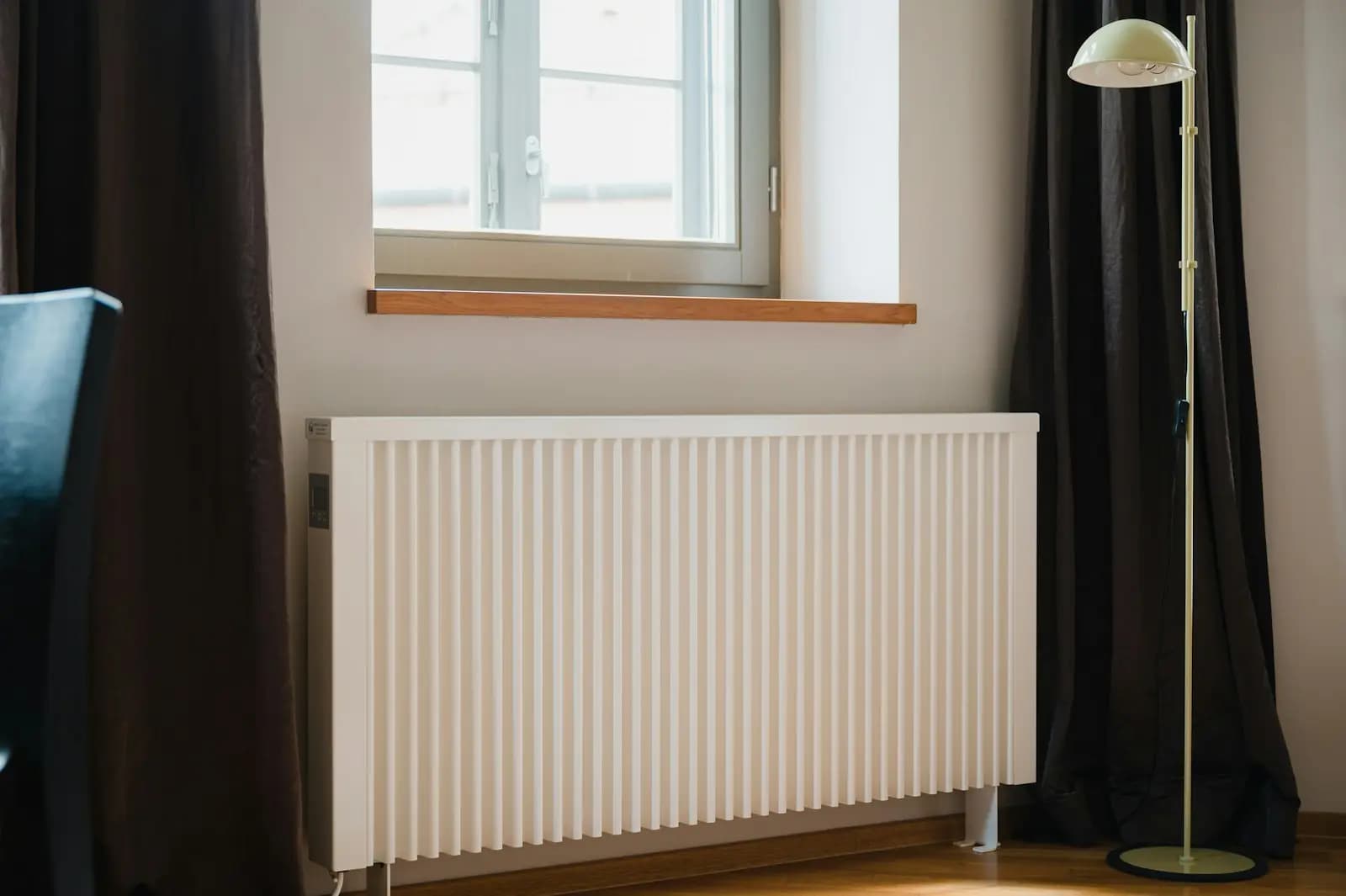 Radiator under a window in a rented room