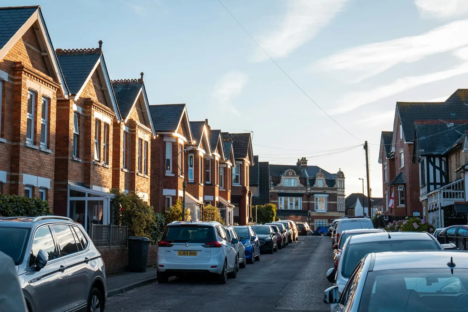 Bay-fronted terraced houses on a residential street