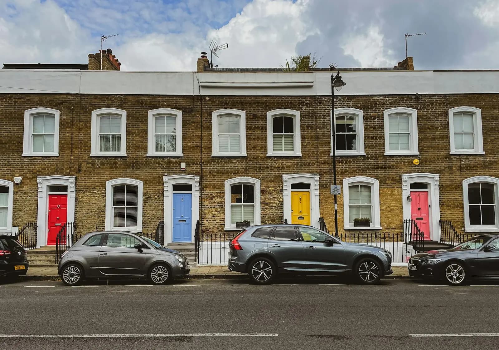 A Georgian terrace with coloured front doors