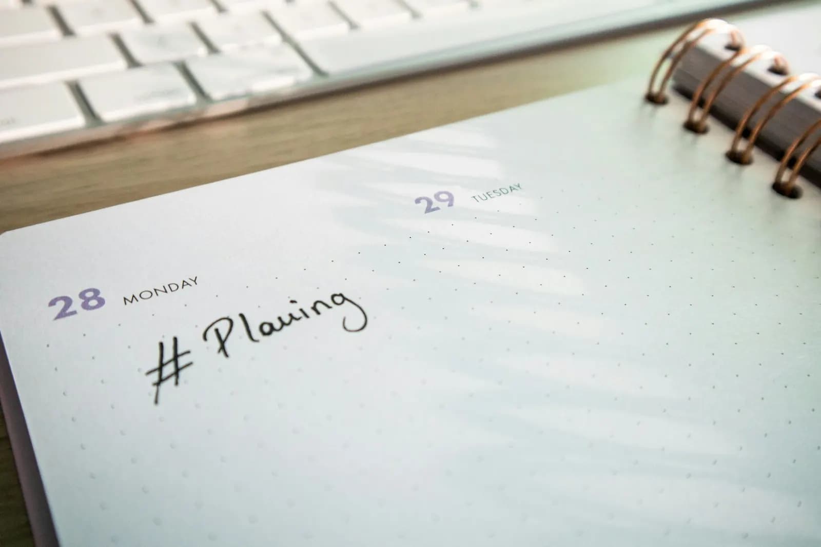 A planner open on a desk