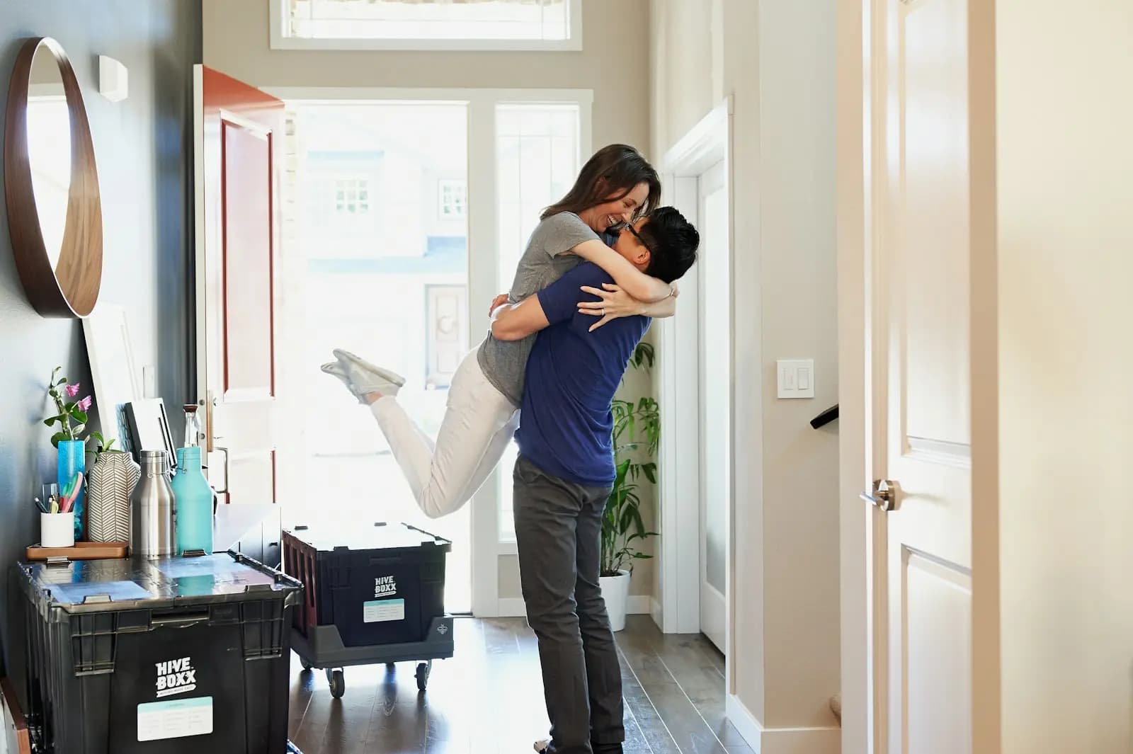 A couple celebrating moving into their new home